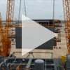 The living quarters being installed onto the platform (video)